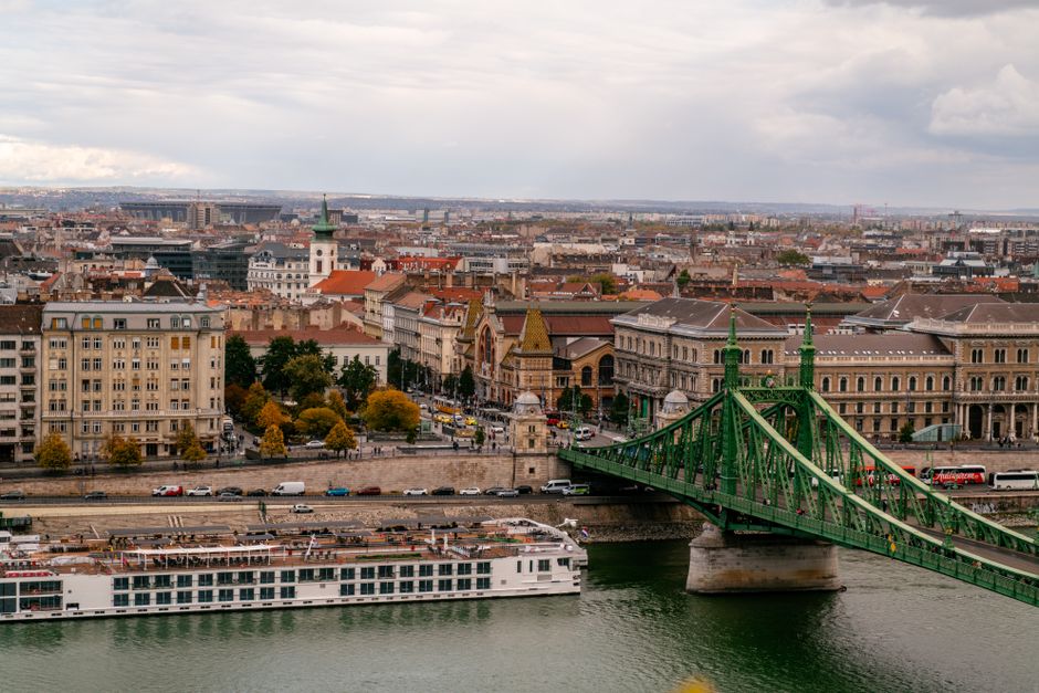 A captivating view of Budapest's Liberty Bridge with historical architecture and urban charm.